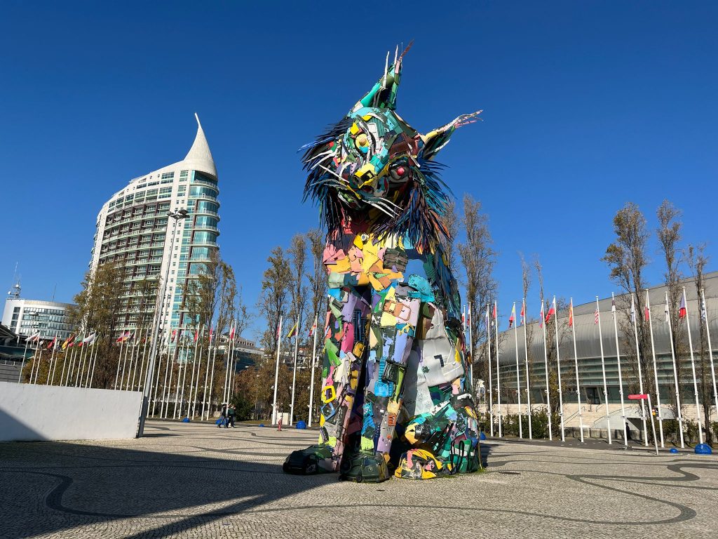 A cat made out of garbage bins