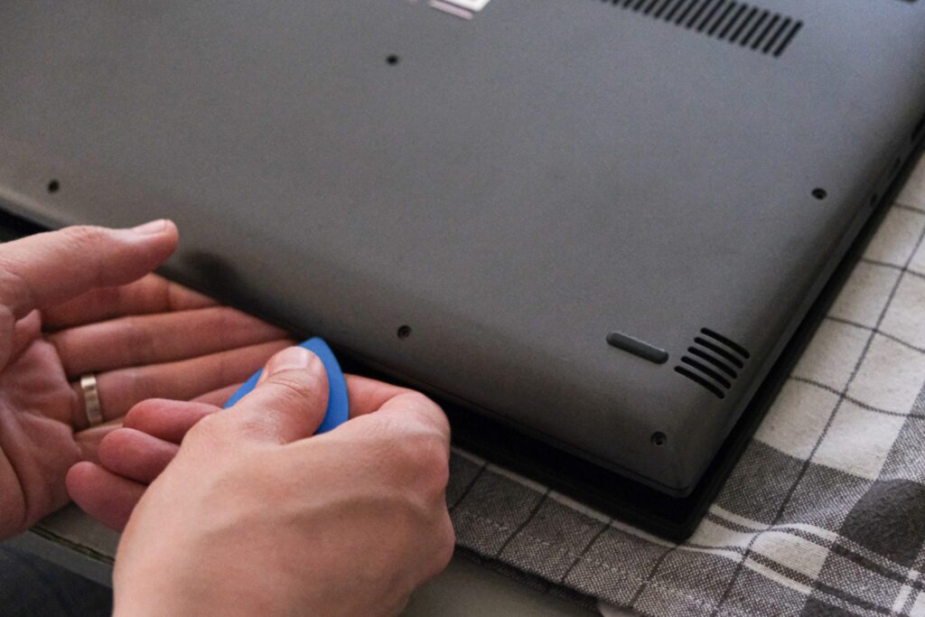 Removing the back cover of the laptop