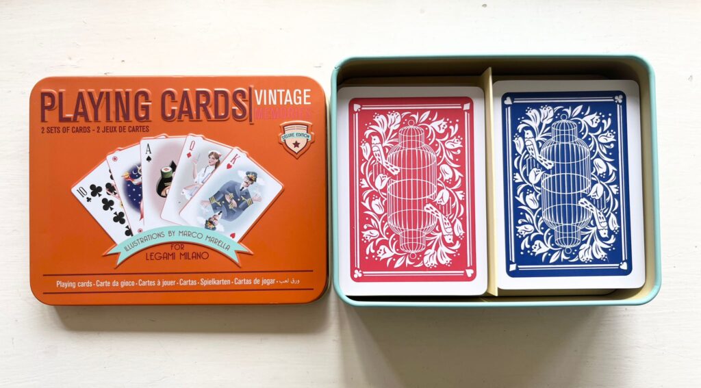 Playing cards in a steel case